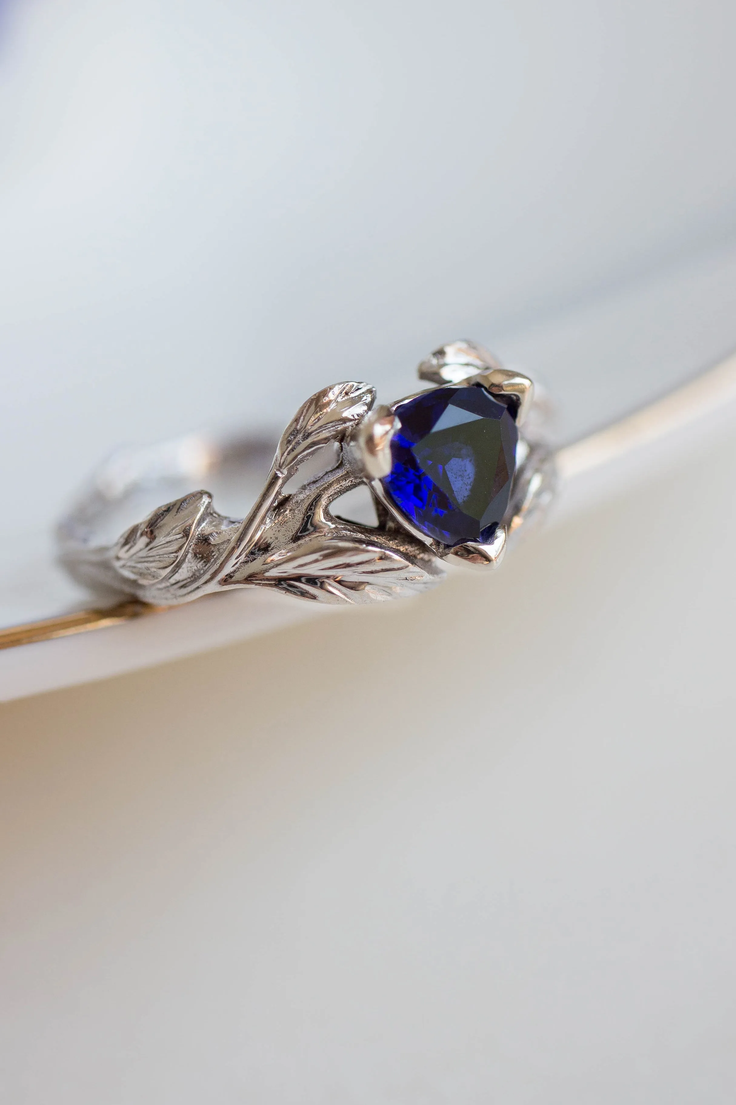 Clematis | branch engagement ring setting, trillion gemstone