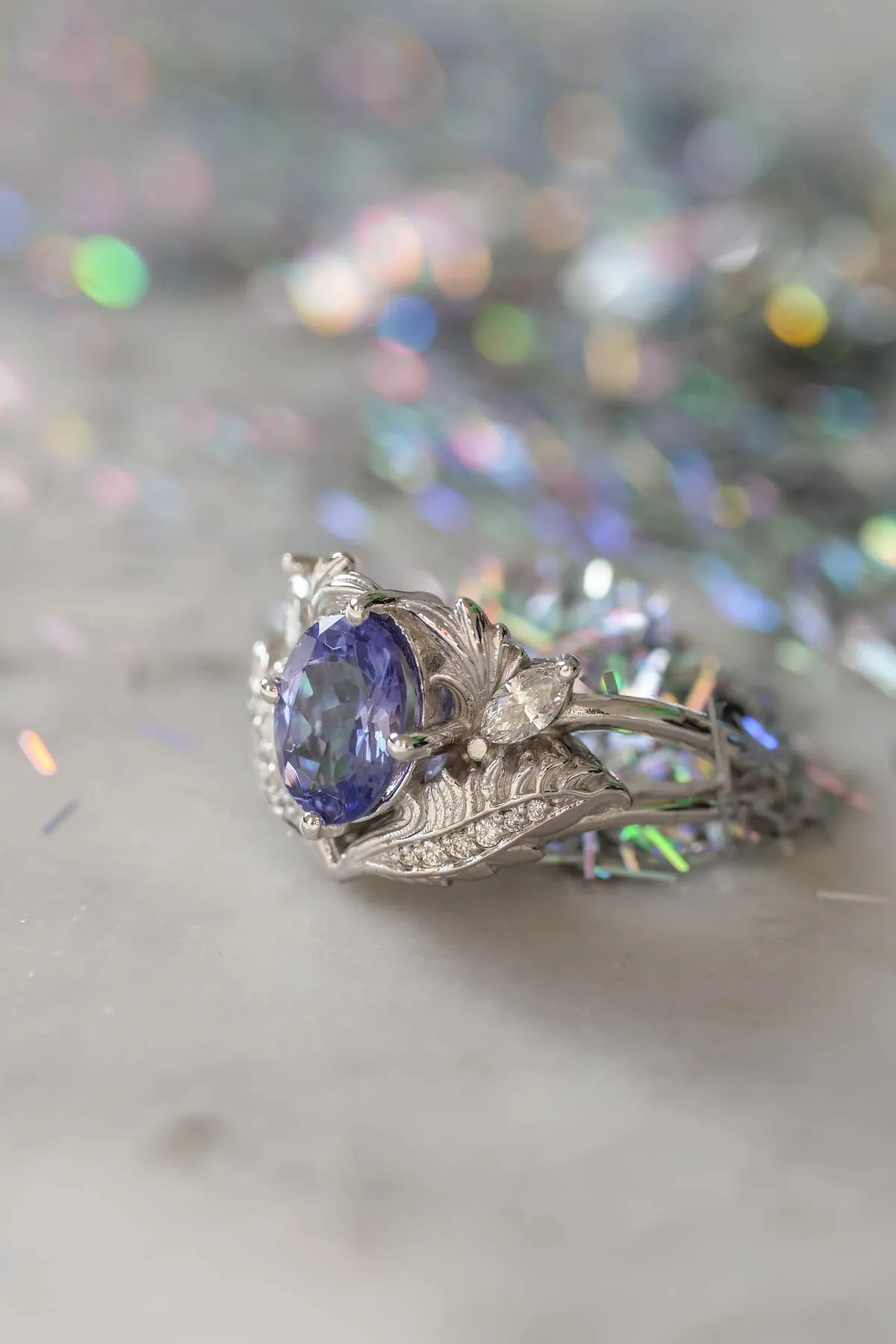 Engagement ring with tanzanite and diamonds / Adonis