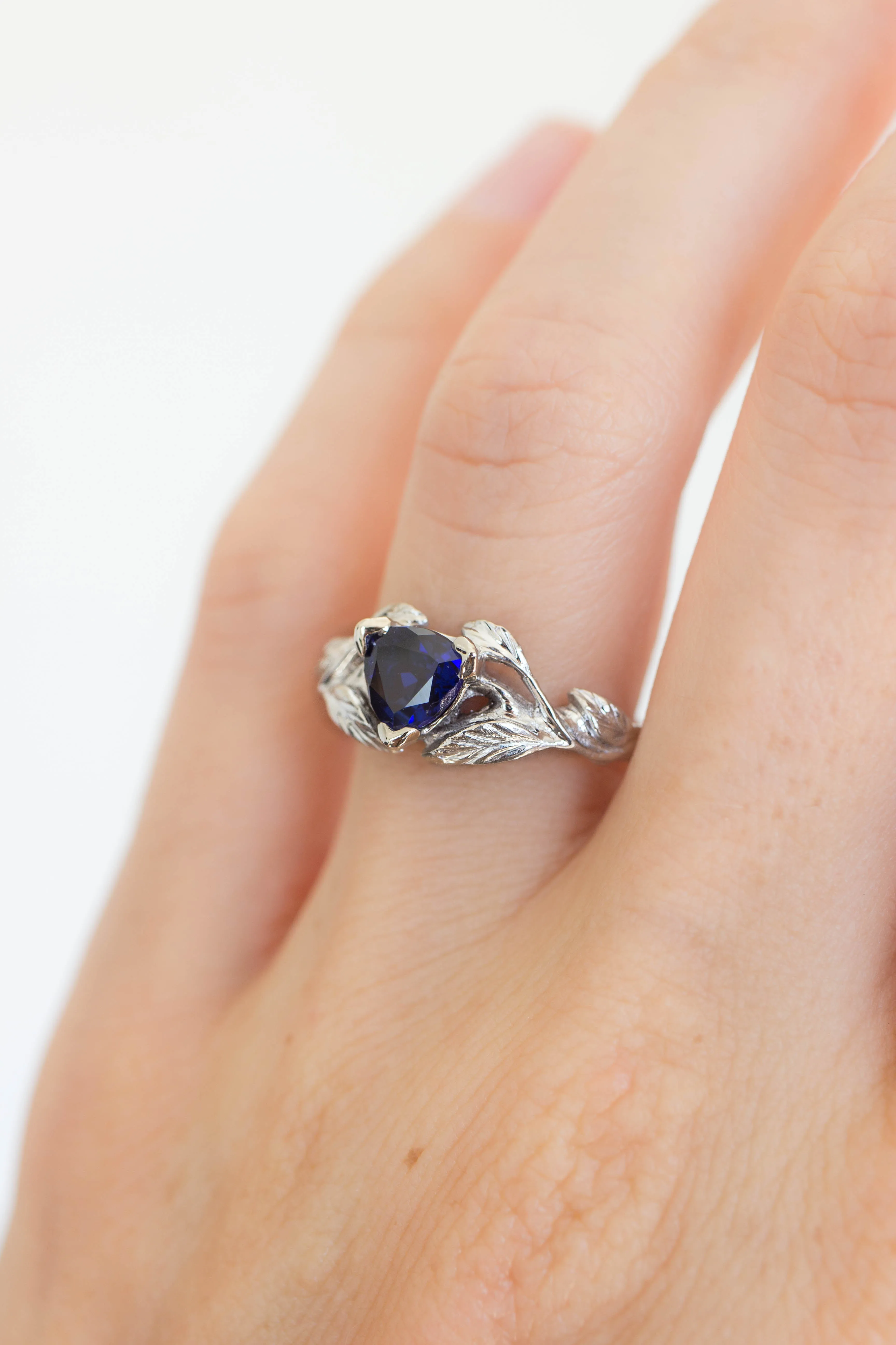 Trillion cut sapphire ring / Clematis